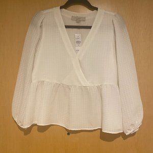 White Peplum V-neck top